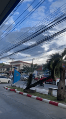 Motorcyclist refuels at PTT station in Baan Mae Nam