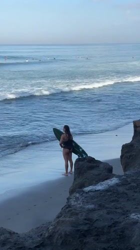 Morning surf session on North Kuta's black sand beaches