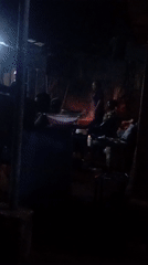 Nighttime outdoor gathering captured on video April 6
