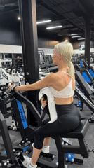 Woman exercises at neon-lit gym in Choeng Mon, Thailand