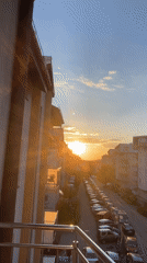 Urban sunset observed from high building vantage point