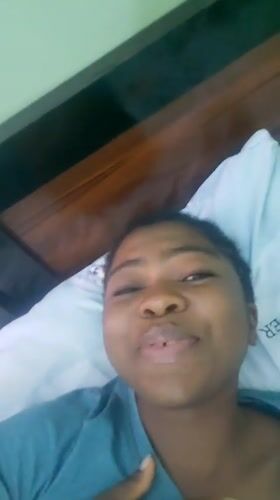 Young Woman's Playful Bedroom Moments Captured in Nigeria