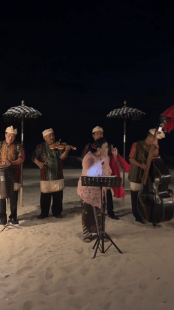 Traditional Balinese musicians perform beachside concert in Kuta Selatan