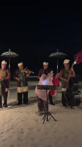 Traditional Balinese musicians perform beachside concert in Kuta Selatan