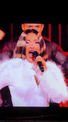 Woman performs with backup dancers in Sofia