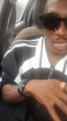 Man in striped jacket observed in car in Adankolo
