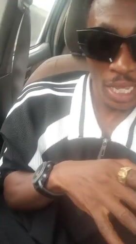 Man in striped jacket observed in car in Adankolo