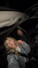 Couple enjoys music while driving through Montenegro at night