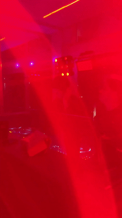 DJs perform at illuminated station in Villazzano II, Italy