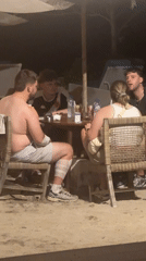 Dog joins diners at outdoor cafe in Nusa Penida