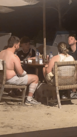 Dog joins diners at outdoor cafe in Nusa Penida