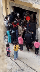 Civilians shelter in damaged Khan Yunis building