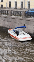 Boat traffic observed on Saint Petersburg canals near Kazan Cathedral