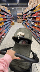 Parent shops with baby at Florianópolis supermarket
