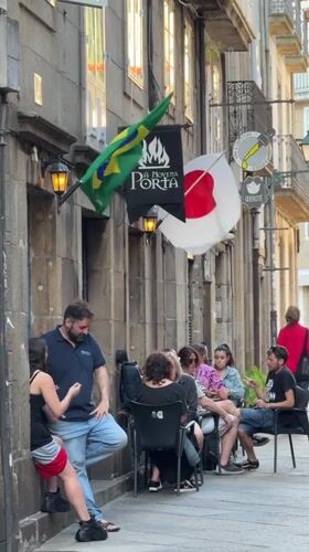 Brazilian flag flies outside Santiago de Compostela street venue