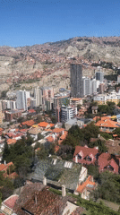 Cable car rider films panoramic view of La Paz