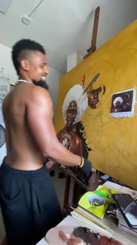 Artist paints traditional portraits using smartphone reference in Nigerian studio