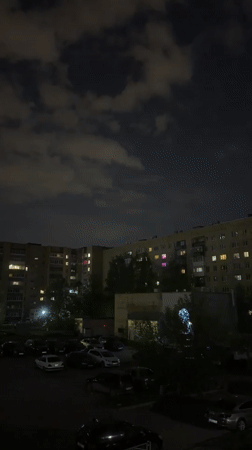 Evening lights illuminate Yekaterinburg apartment complex windows