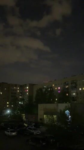 Evening lights illuminate Yekaterinburg apartment complex windows