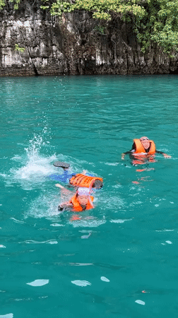 Early morning swimmers spotted in turquoise waters near Ao Nang