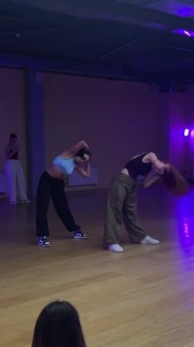Two women perform choreographed routine in Balashikha dance studio