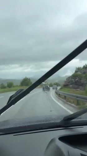 Driver records wet road conditions near Obzovica, Montenegro