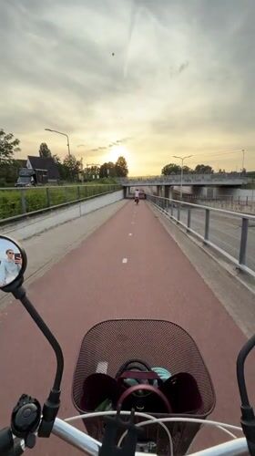 Evening life captured across Helmond: cycling, ice cream, cats