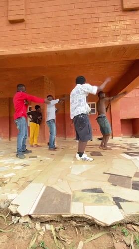 Young men perform synchronized dance routine in Vom Nigeria