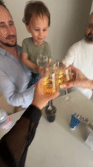 Family celebration with toasts and balloons in Acre
