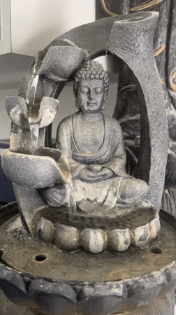 Buddha fountain display documented in Porlamar, Venezuela