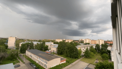 Storm clouds gather over Izhevsk on a dark July afternoon