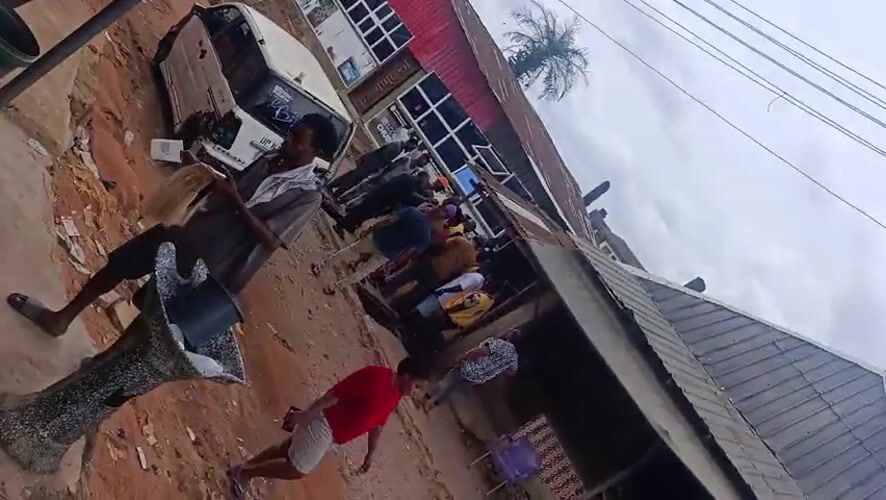 Crowds gather in Nigerian neighborhoods during midday
