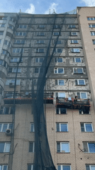 Construction work underway on Moscow building with elevator
