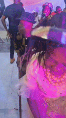 Indoor celebration with traditional dancing in Dutsen Alhaji, Nigeria