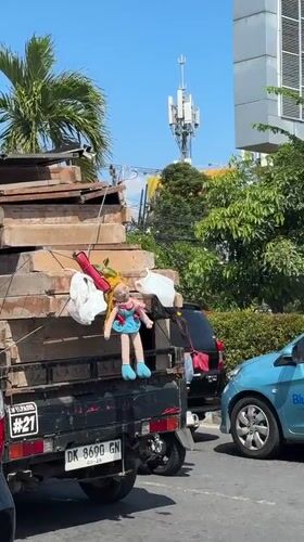 Lumber truck with doll charm spotted in Kuta traffic