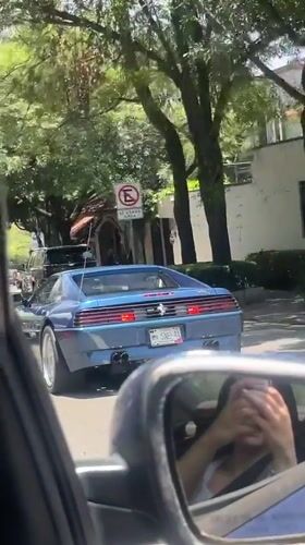 Blue Ferrari spotted driving through Mexico City residential area