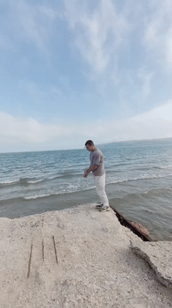 Man performs acrobatic stunts on Black Sea pier in Varna