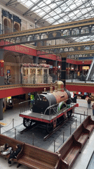 Visitor explores Gallery department store's vintage train display in Petersburg