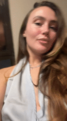 Two women dine at Surgut restaurant, share meal and photos