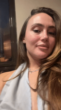 Two women dine at Surgut restaurant, share meal and photos