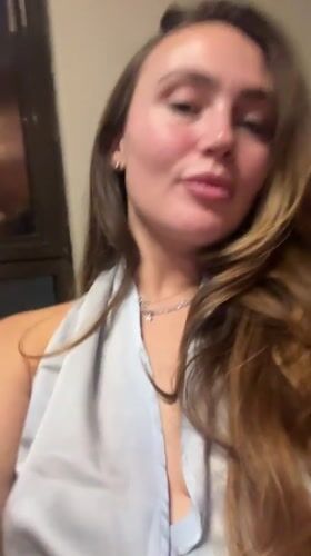 Two women dine at Surgut restaurant, share meal and photos