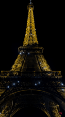 Eiffel Tower displays nightly illumination in Paris