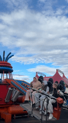 Carnival riders enjoy spinning attraction in Sirius, Russia