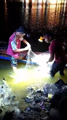 Evening waterfront life documented across Lhokseumawe, Indonesia