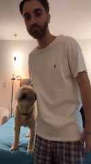 Man plays with dogs, takes selfie in Mexico bedroom