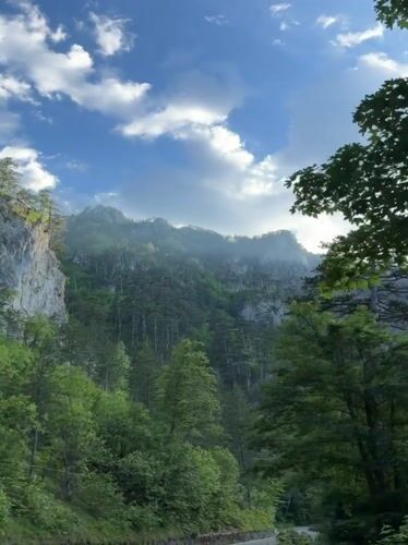 Traveler captures Montenegro mountain scenery from moving vehicle