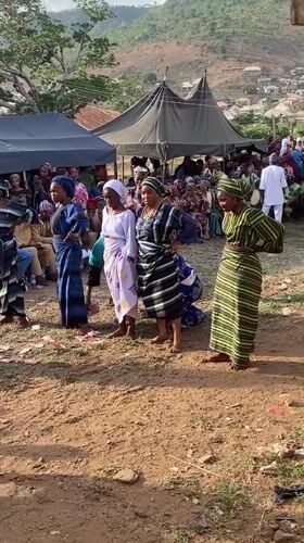 Five women dance for crowd in Lokoja outdoor gathering