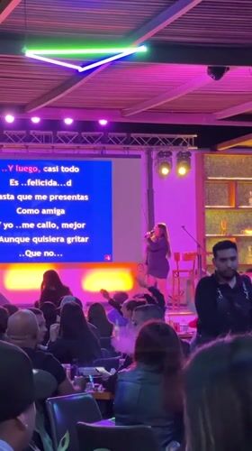 Late-night karaoke session draws crowd at Arica bar