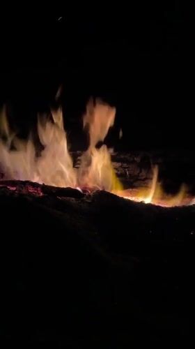 Campfire burning at night on Ko Phangan, Thailand