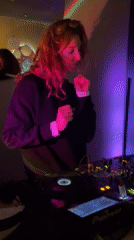 Red-haired DJ performs at Montenegro nightclub